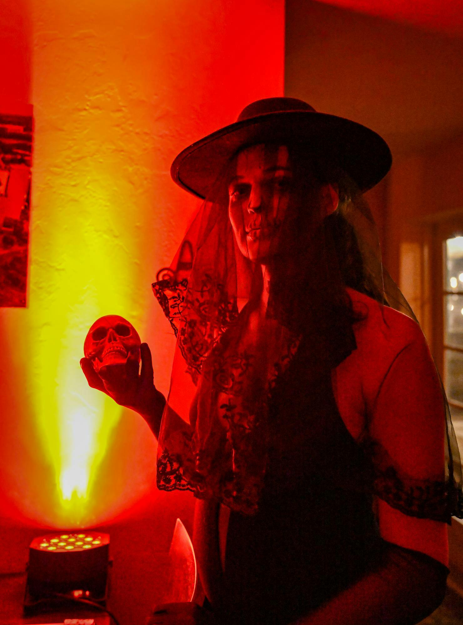 Juno takes on the role of Clara Winslow, a 1920s vampire, at Gainesville by Night's vampire masquerade live-action role-playing game, Saturday, Jan. 31, 2026.