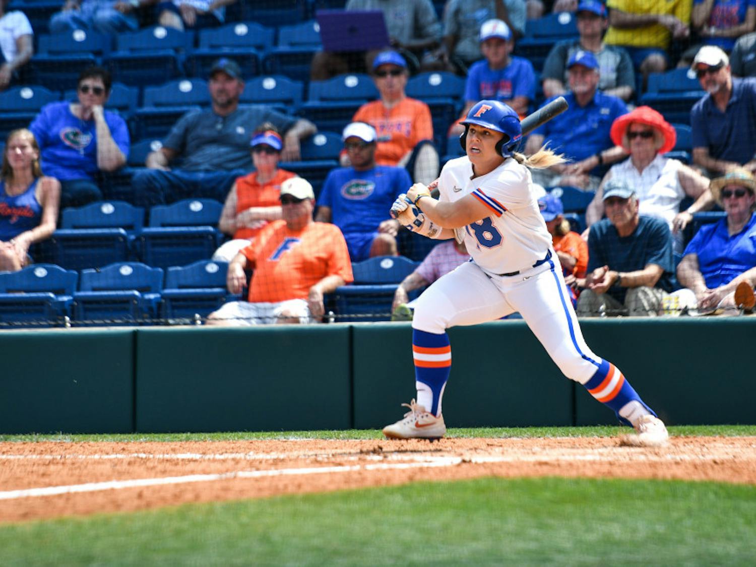 The Gators edged past Alabama to win their second-straight SEC Tournament championship behind Kelly Barnhill's brilliant outing and Amanda Lorenz's two-RBI double.