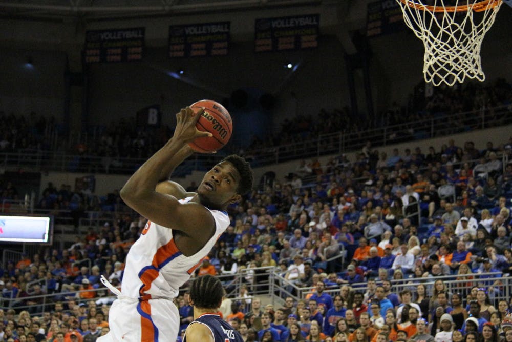 UF’s John Egbunu grabs a rebound during Florida’s 95-63 win against Auburn on Jan. 23, 2016, in the O’Connell Center.