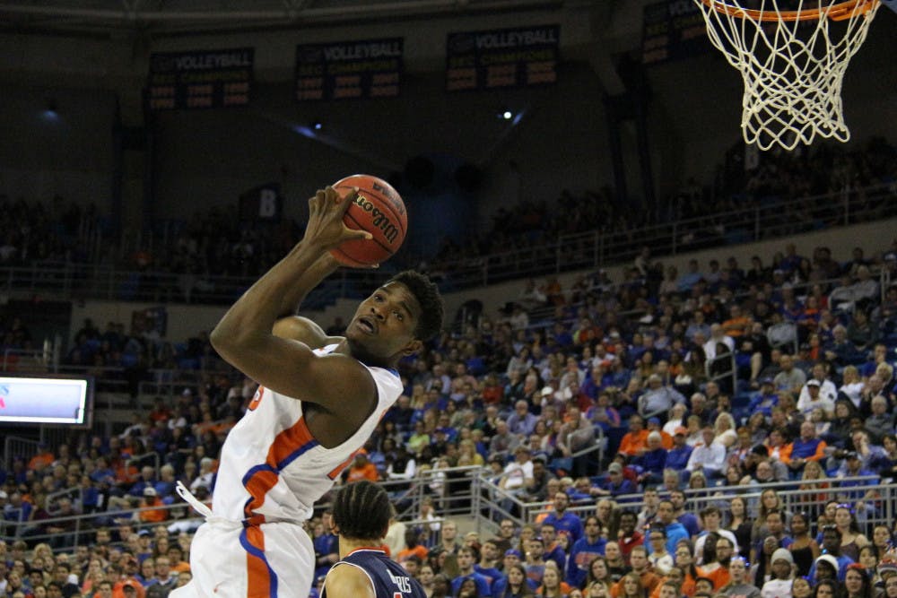 <p>UF’s John Egbunu grabs a rebound during Florida’s 95-63 win against Auburn on Jan. 23, 2016, in the O’Connell Center.</p>