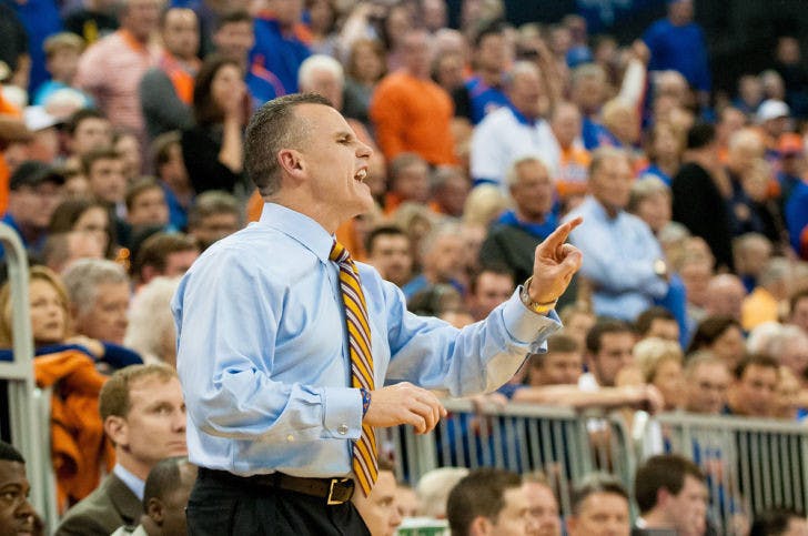 Billy Donovan looks down the court during Florida’s 67-61 win against Kansas on Dec. 10, 2013 in the O’Connell Center. On Monday, Donovan said this year’s Gators are different compared to his back-to-back title-winning teams.