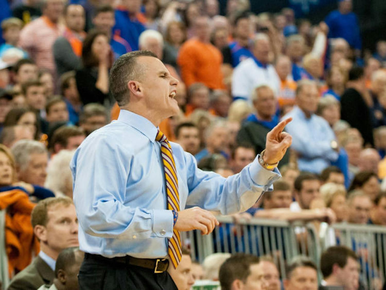 Billy Donovan looks down the court during Florida’s 67-61 win against Kansas on Dec. 10, 2013 in the O’Connell Center. On Monday, Donovan said this year’s Gators are different compared to his back-to-back title-winning teams.