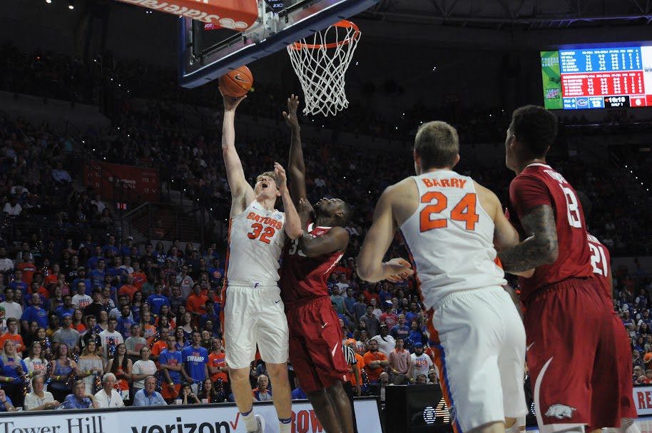 UF center&nbsp;Schuyler Rimmer attempts a lay-up during Florida's 78-65 win against Arkansas on March 1, 2017, in the O'Connell Center.&nbsp;