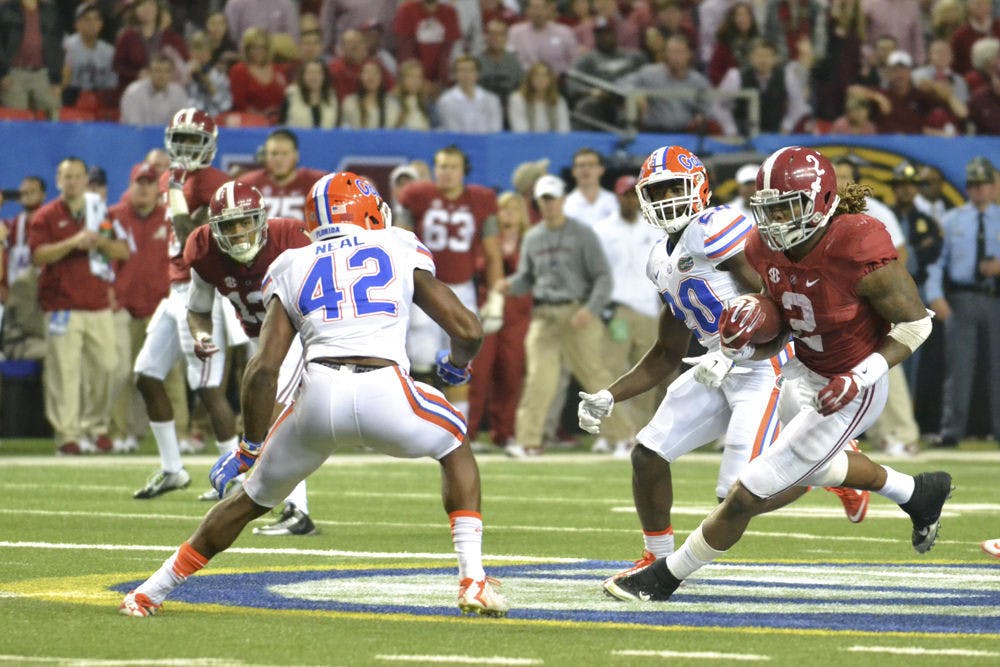 UF safety Keanu Neal prepares to tackle Derrick Henry during the 2015 Southeastern Conference Championship Game