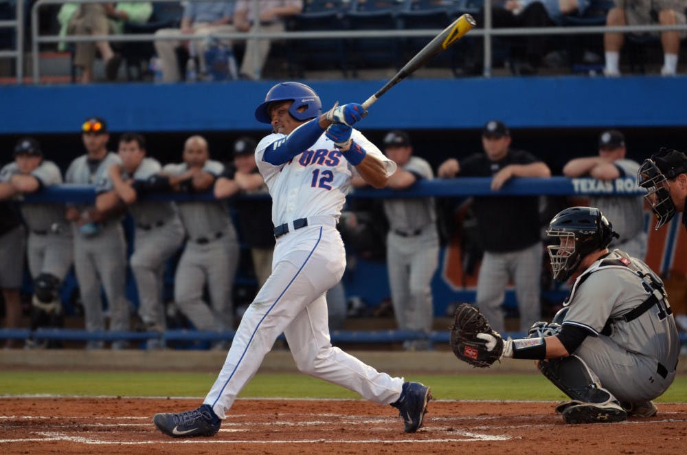 <p>UF's Richie Martin follows through on his swing during Florida's 14-3 win against the South Carolina Gamecocks on April 11 at McKethan Stadium.</p>