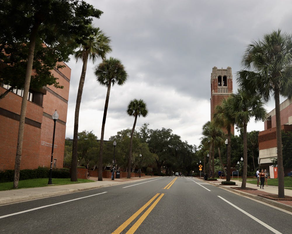Photo of Newell Drive with Century Tower and Marston Science Library visible in the view