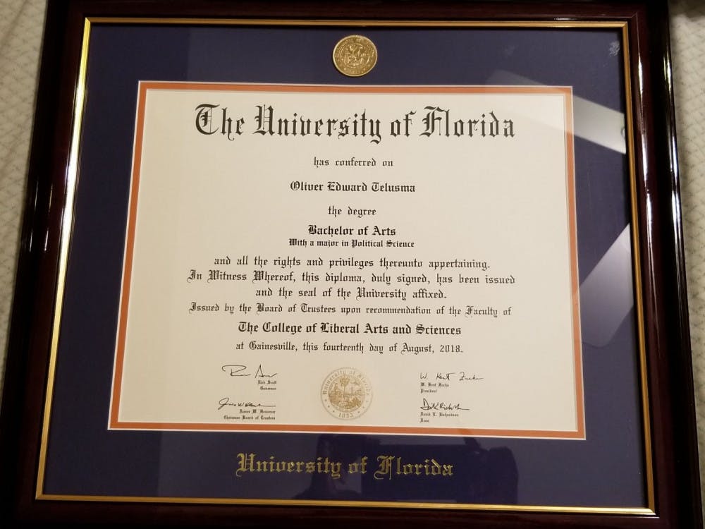 A framed diploma given to one of the graduates rushed off stage.