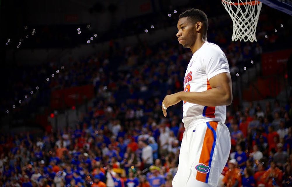 <p>UF forward Justin Leon walks on the court during Florida's 93-54 win against Missouri on Feb. 2, 2017, in the O'Connell Center.&nbsp;</p>