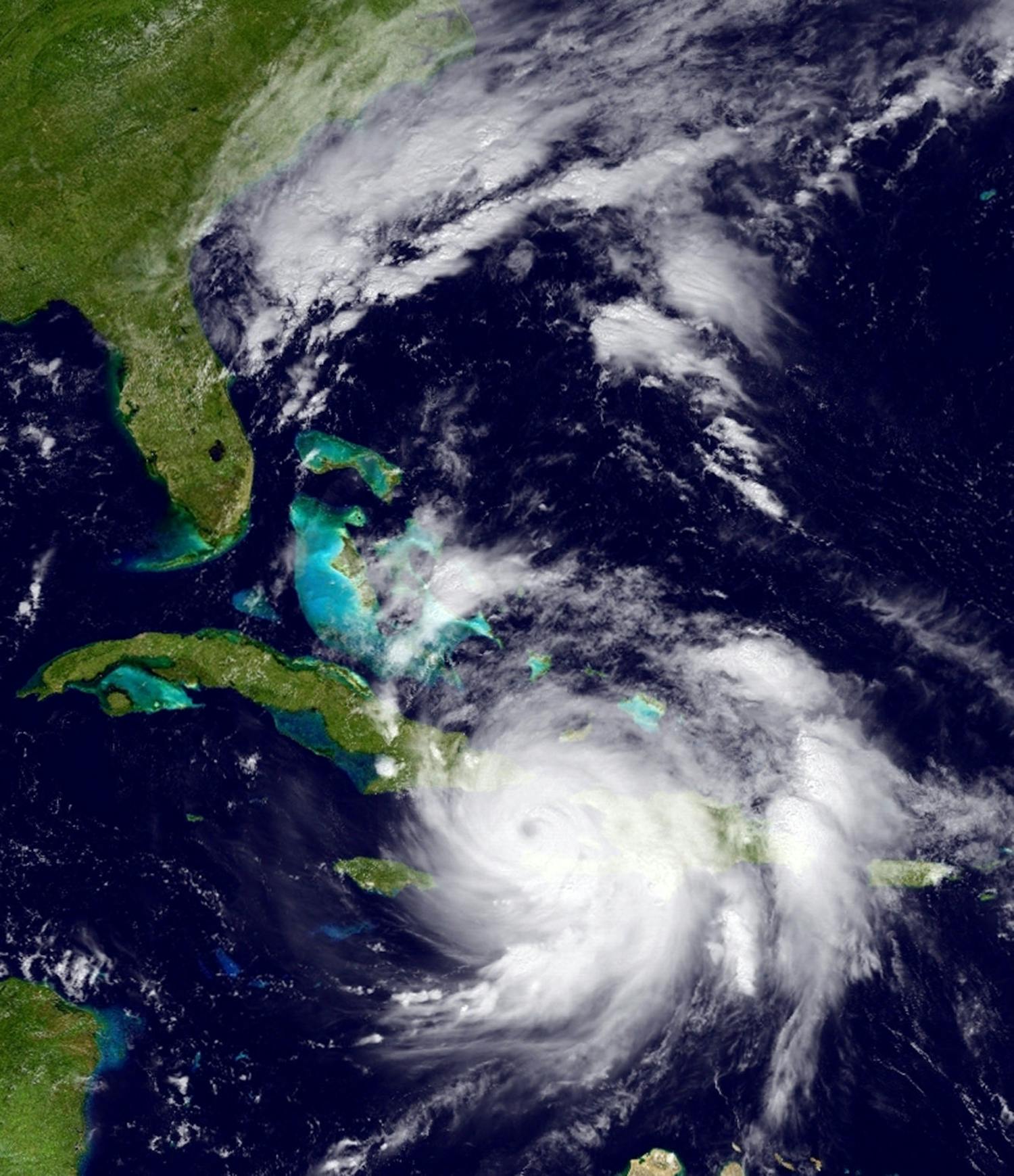 The GOES East satellite image provided by the National Oceanic and Atmospheric Administration (NOAA) and taken Tuesday, Oct. 4, 2016 at 1:12 p.m. EDT, shows Hurricane Matthew over the Caribbean region. Hurricane Matthew roared across the southwestern tip of Haiti with 145 mph winds Tuesday, Oct. 4, 2016, uprooting trees and tearing roofs from homes in a largely rural corner of the impoverished country as the storm headed north toward Cuba and the east coast of Florida.