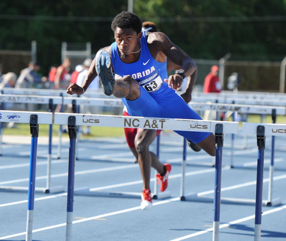 <p>Eddie Lovett leaps over a hurdle during a NCAA East Preliminary Round in Greensboro, N.C., on May 24. Lovett will compete in the 110m hurdles tonight at 8:20.</p>