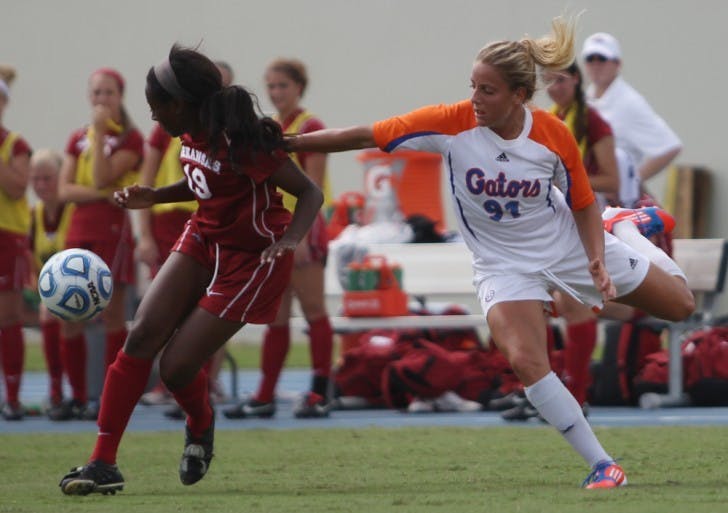 Adriana Leon (91) fights for the ball against Arkansas defender Melanie Foncham (14) in UF's 4-0 win on Sept. 30 at James G. Pressly Stadium. Leon kicked the game-winning goal in the 39th minute against No. 5 Texas A&amp;M on Sunday in College Station, Texas.