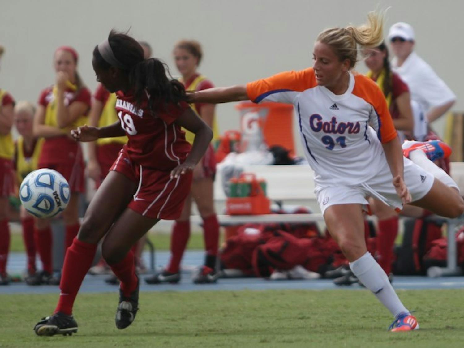 Adriana Leon (91) fights for the ball against Arkansas defender Melanie Foncham (14) in UF's 4-0 win on Sept. 30 at James G. Pressly Stadium. Leon kicked the game-winning goal in the 39th minute against No. 5 Texas A&amp;M on Sunday in College Station, Texas.