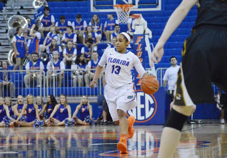 Cassie Peoples drives down the court during Florida’s 81-76 loss to Missouri on Feb. 20 in the O’Connell Center.