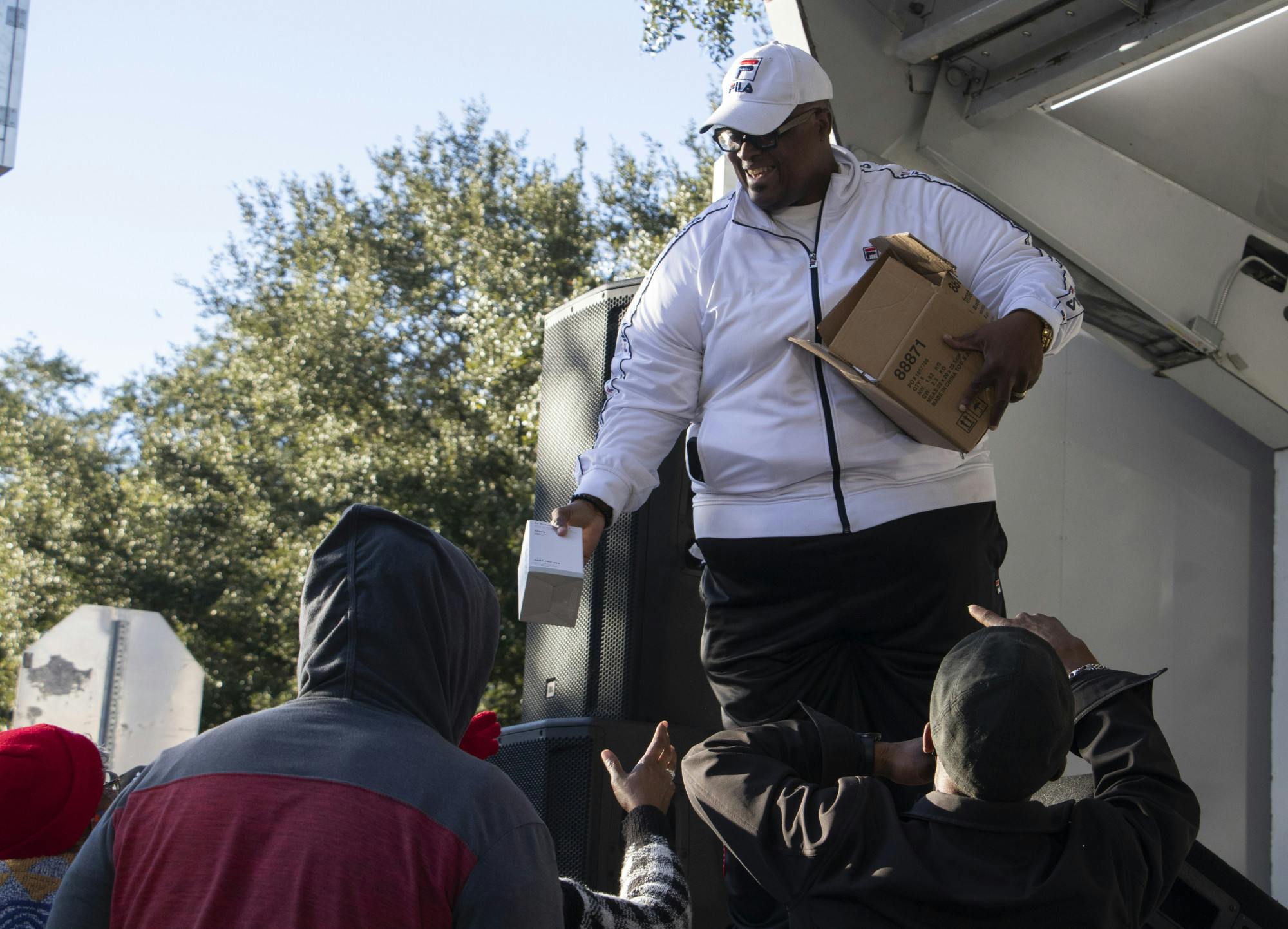 Karl Anderson, Upper Room Ministries pastor, hands out free mugs at the end of the Souls to the Polls event at the Alachua County Supervisor of Elections Office on Sunday, Nov. 14, 2021.