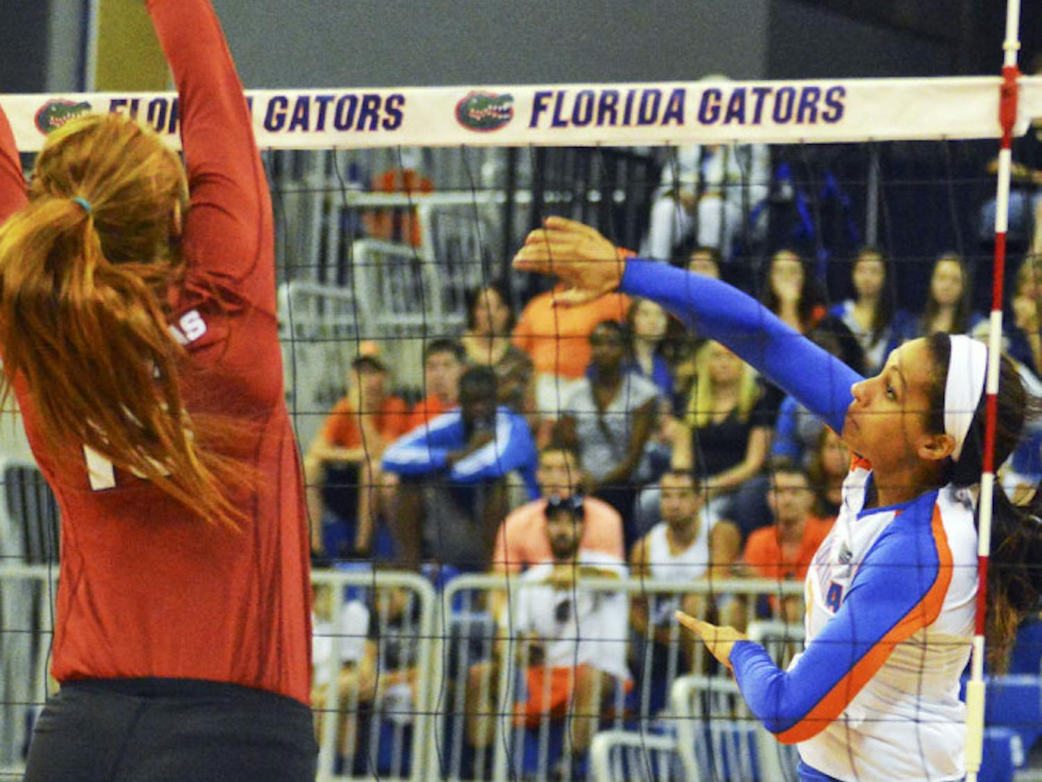 Gabby Mallette swings for a kill attempt during Florida's 3-0 win against Arkansas on Sunday.