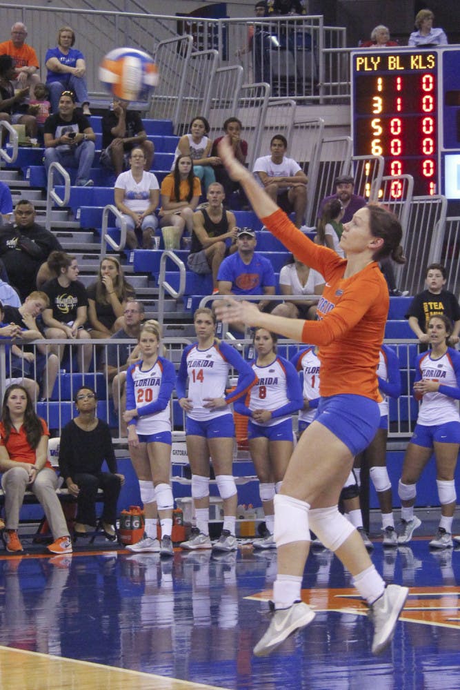 Holly Pole serves the ball during Florida's 3-0 win against Ole Miss on Sunday.