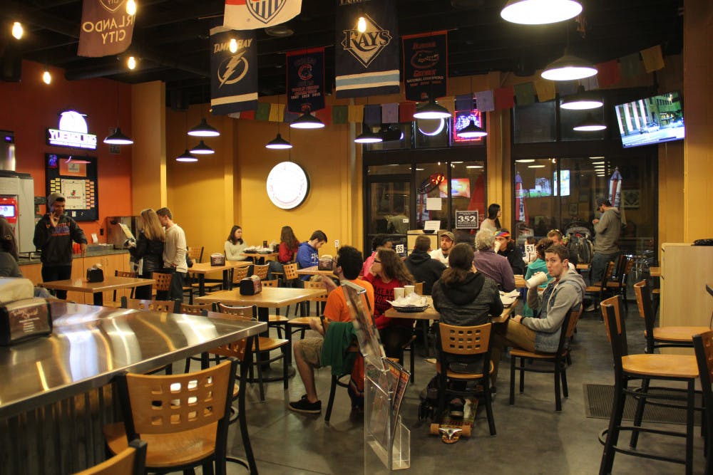 About 25 customers dine at Burrito Bros. Taco Co., located at 1402 W. University Ave., on Sunday night. The restaurant has been serving the Gainesville community since 1976. 