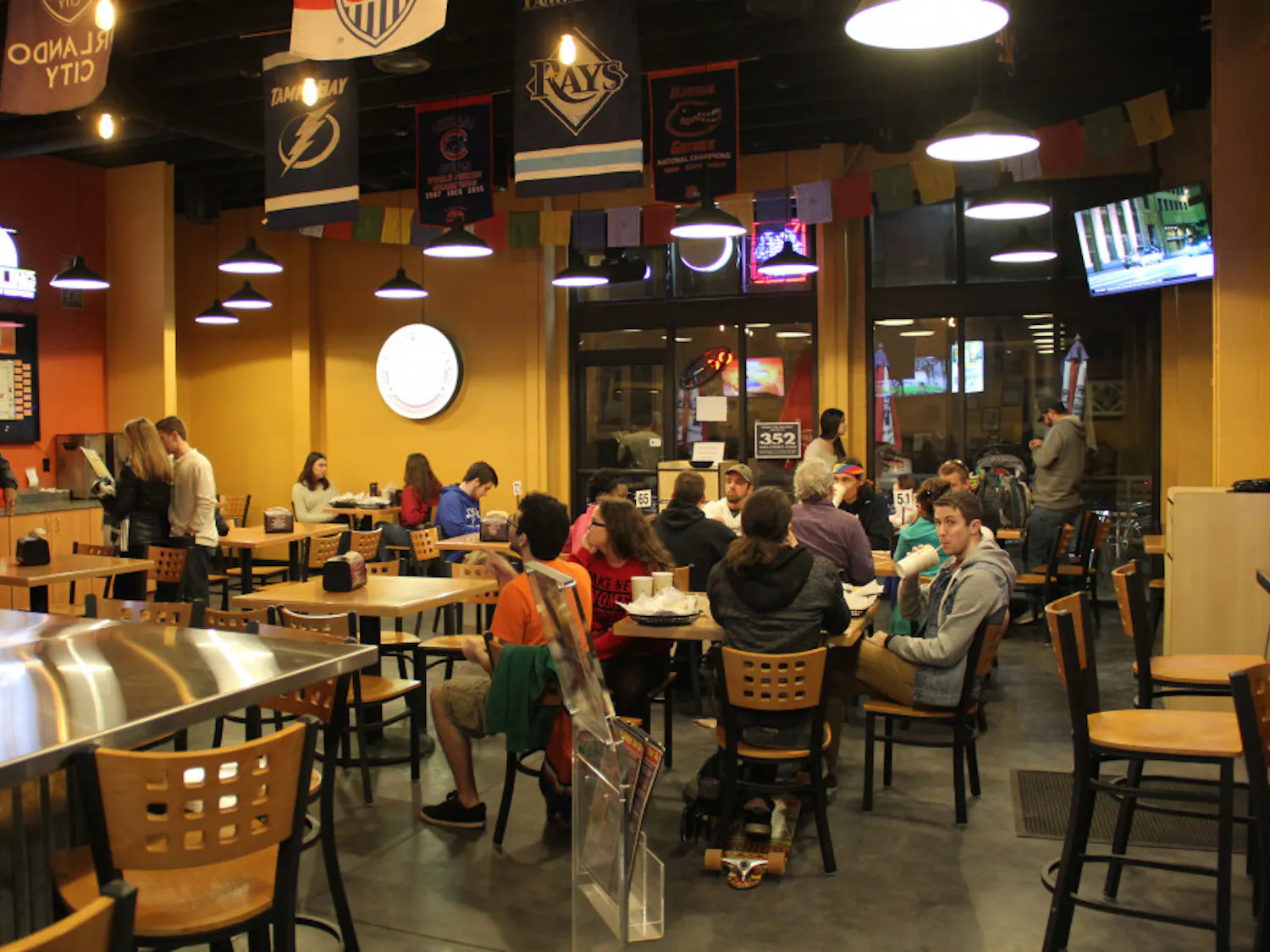 About 25 customers dine at Burrito Bros. Taco Co., located at 1402 W. University Ave., on Sunday night. The restaurant has been serving the Gainesville community since 1976.