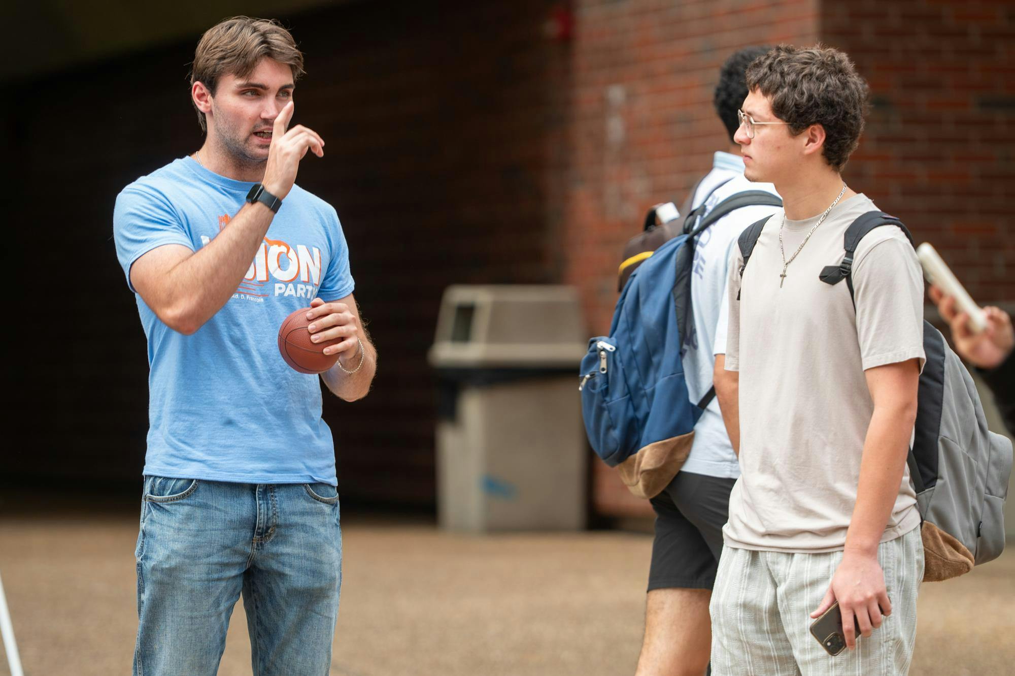 Members of the Vision Party campaign to students around the UF campus in Gainesville, Fla., on Tuesday, Sept. 30, 2025. This is the first election in recent years in which only one party is running.