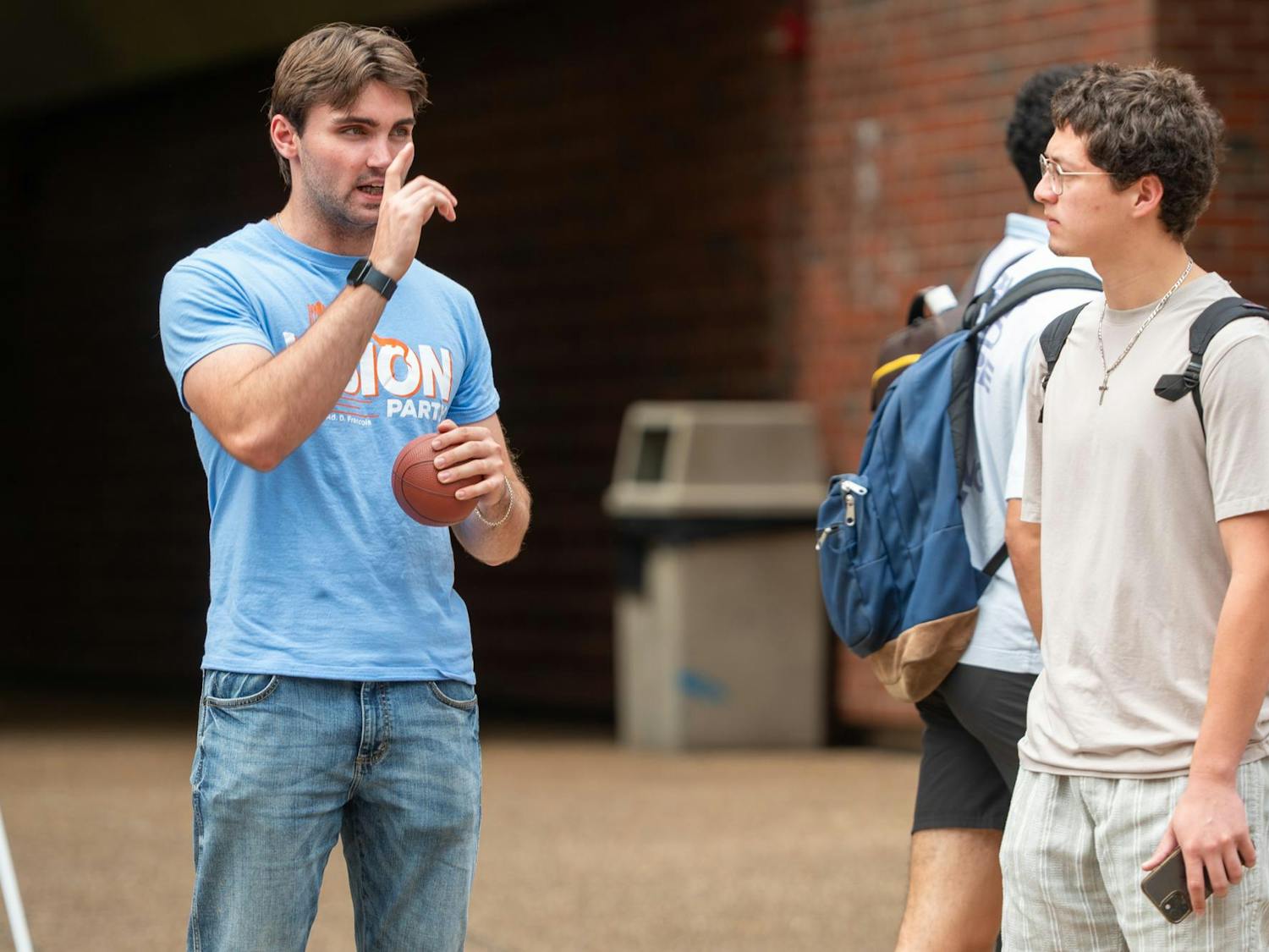 Members of the Vision Party campaign to students around the UF campus in Gainesville, Fla., on Tuesday, Sept. 30, 2025. This is the first election in recent years in which only one party is running.