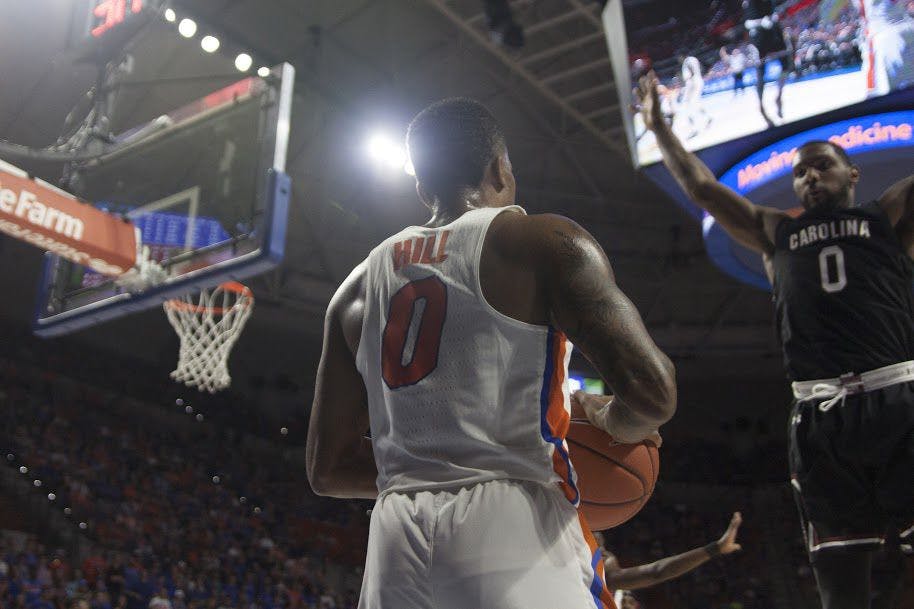 UF guard Kasey Hill looks to inbound the ball during Florida's 81-66 win against South Carolina on Feb. 21, 2017, in the O'Connell Center.