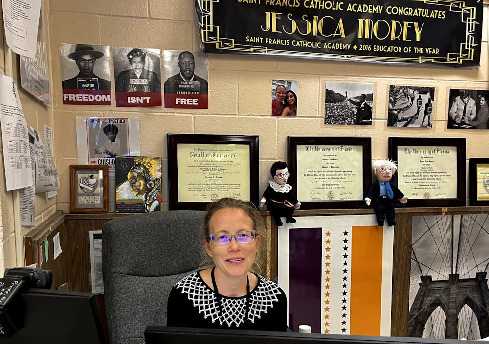 Jessica Morey, Buchholz High School history teacher, poses for a portrait inside of her classroom on Thursday, Feb. 17. She said she's always been passionate about teaching African history and working with diverse groups of students.