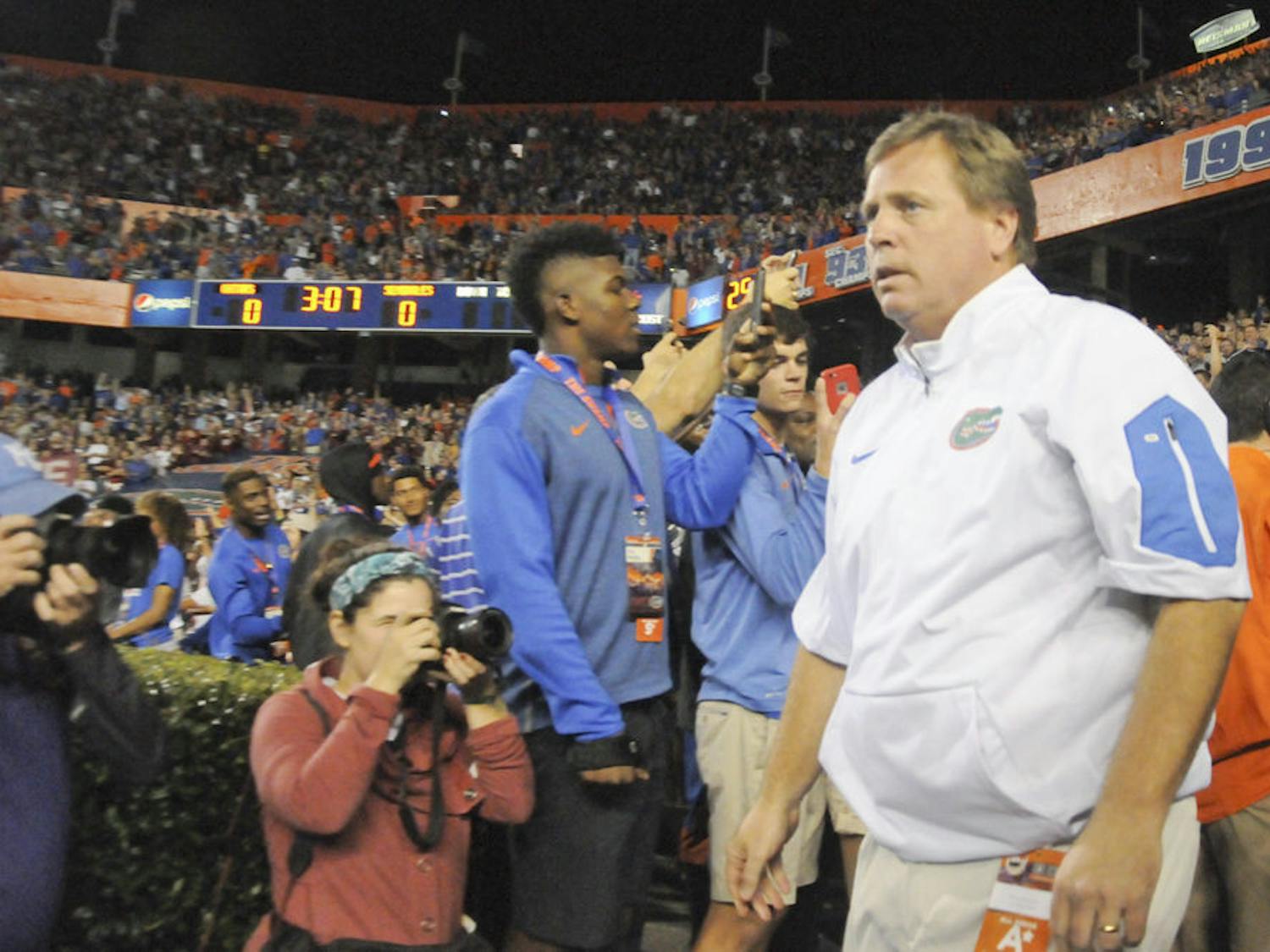 UF coach Jim McElwain walks out of the tunnel prior to Florida's 27-2 loss to Florida State on Nov. 28, 2015, at Ben Hill Griffin Stadium.