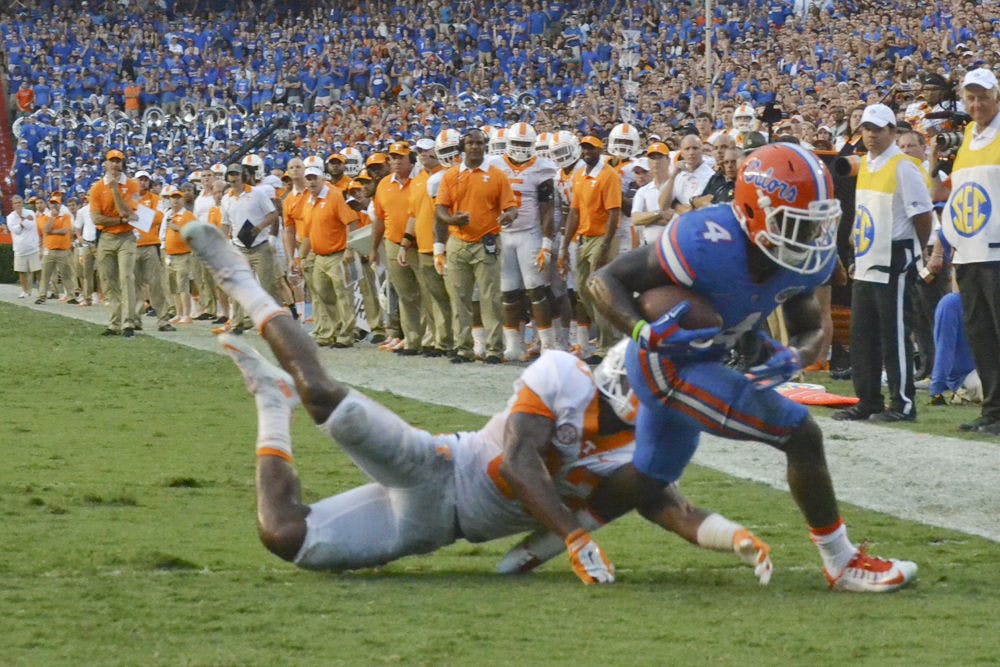 <p>UF wide receiver Brandon Powell lunges into the endzone for a touchdown during Florida's 28-27 win against Tennessee on Sept. 26, 2015, at Ben Hill Griffin Stadium.</p>