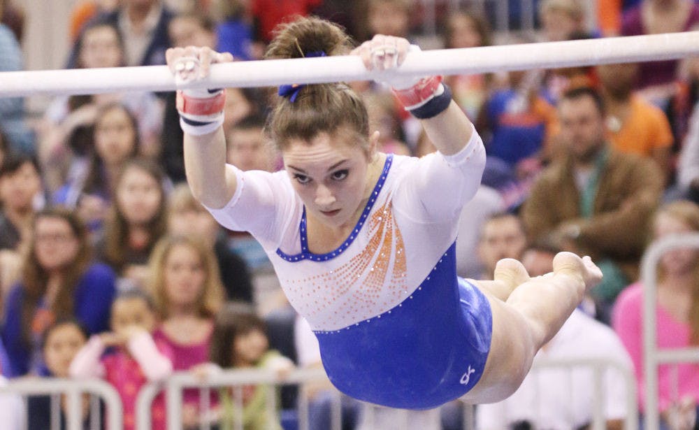 Bianca Dancose-Giambattisto competes on bars during Florida's win against Arkansas on Feb. 14.
