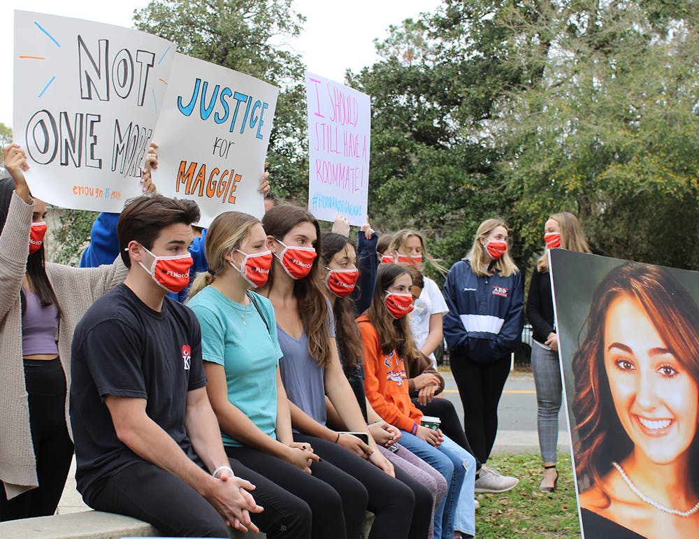 Members of the Florida Not One More student group attend a press conference held by two attorneys representing the families of Maggie Paxton and Sophia Lambert in wrongful death lawsuits on Wednesday, March 3, 2021. The conference included statements from each attorney and the family of Sophia Lambert, read by Rabbi Jonah Zinn, the executive director of UF Hillel. 