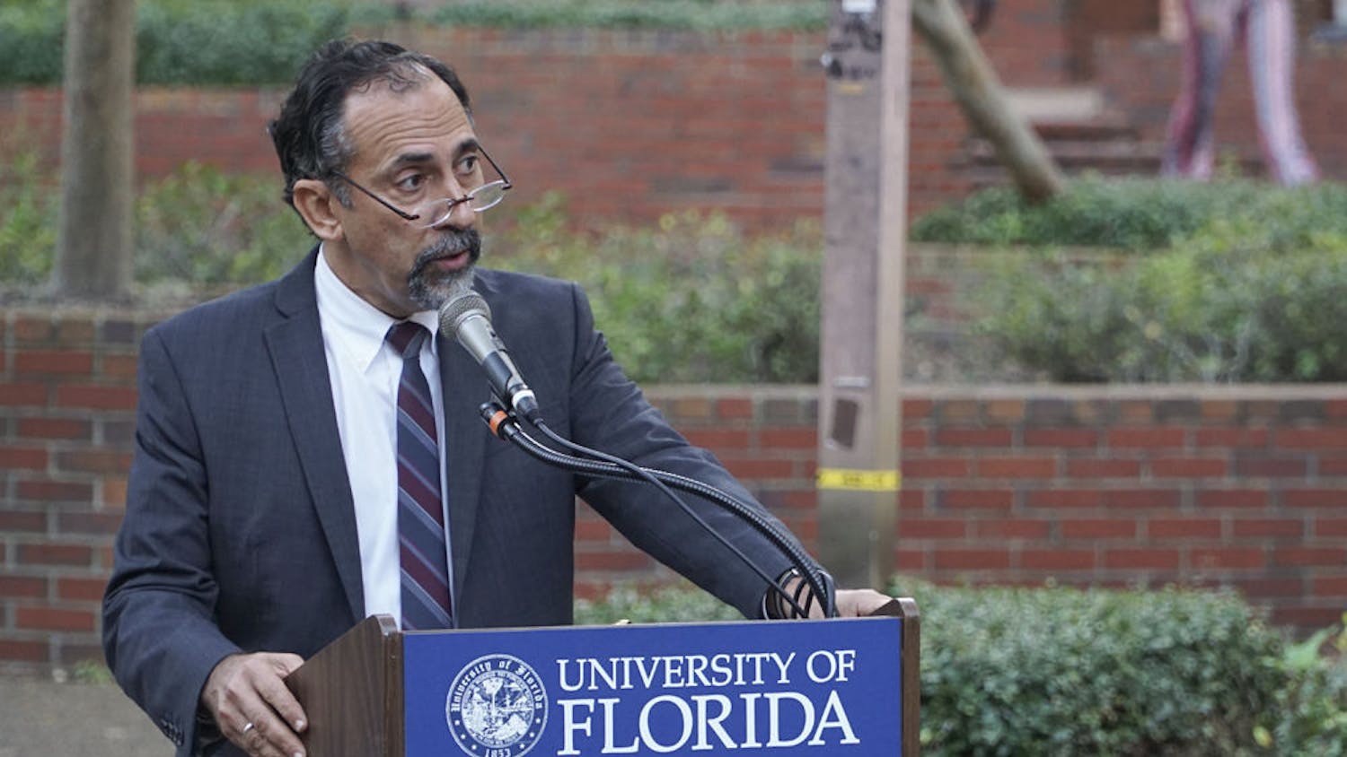 Leonardo Villalon, Dean of UF’s International Center, speaks at the vigil. He said the only antidote to terror is coming together in solidarity despite cultural and religious differences.