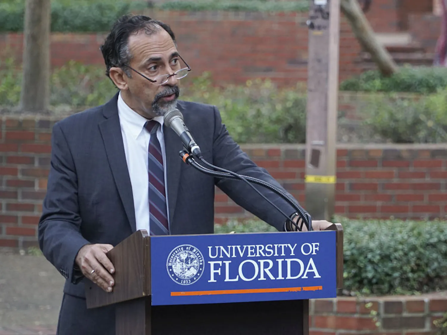 Leonardo Villalon, Dean of UF’s International Center, speaks at the vigil. He said the only antidote to terror is coming together in solidarity despite cultural and religious differences.