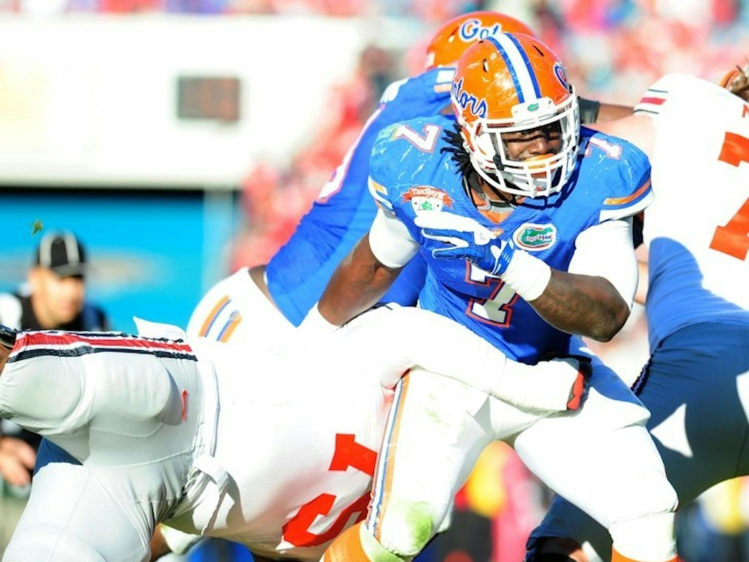 Florida defensive end/linebacker Ronald Powell was one of five Gators to sack Buckeyes freshman quarterback Braxton Miller during Monday's Gator Bowl.