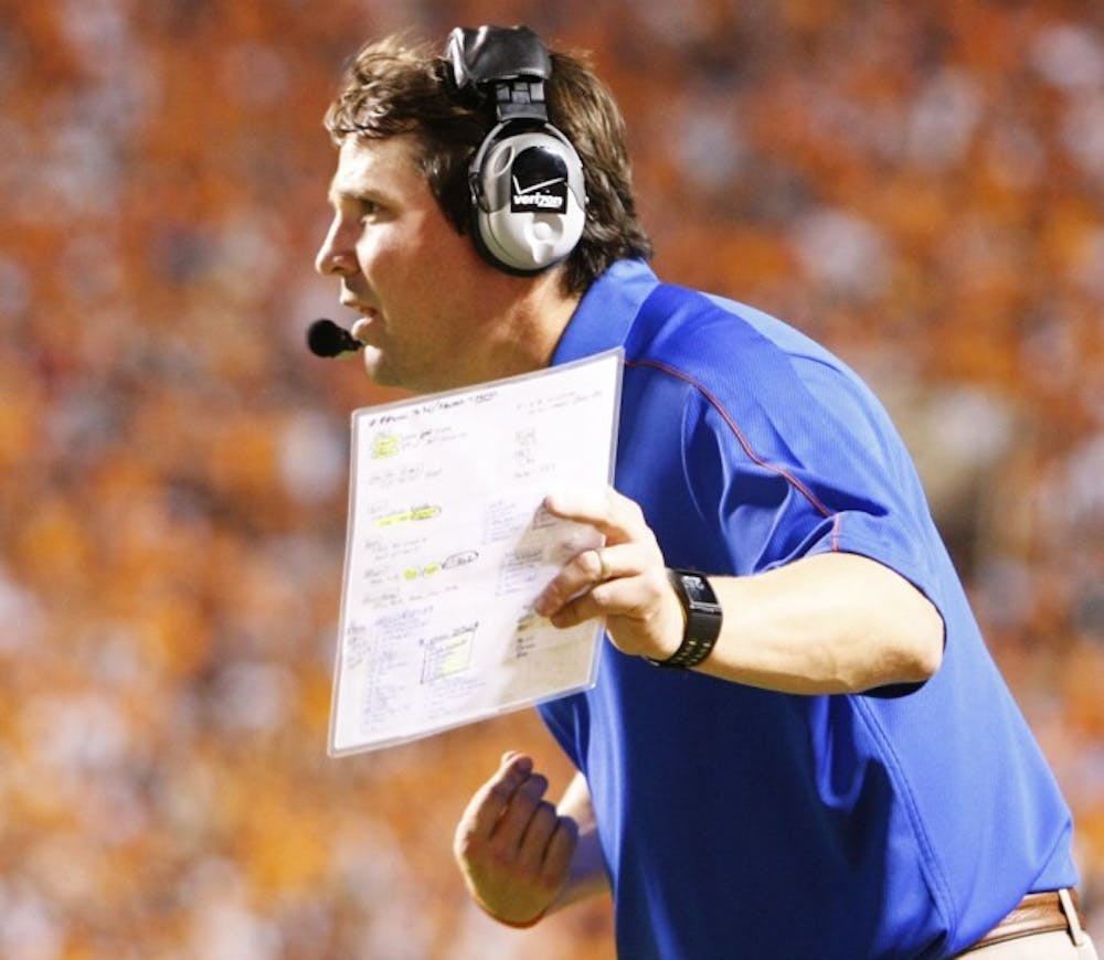 <p>UF head coach Will Muschamp reacts to a penalty during UF's 37-20 win against Tennessee at Neyland Stadium on Saturday.</p>