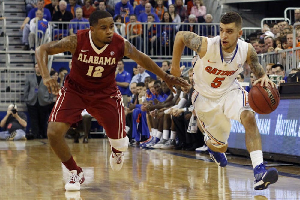 <p align="justify">Junior point guard Scottie Wilbekin dribbles down the court during Florida’s 64-52 win against Alabama on March 2 in the O’Connell Center. Wilbekin is playing in his third Sweet 16 as a Gator.</p>