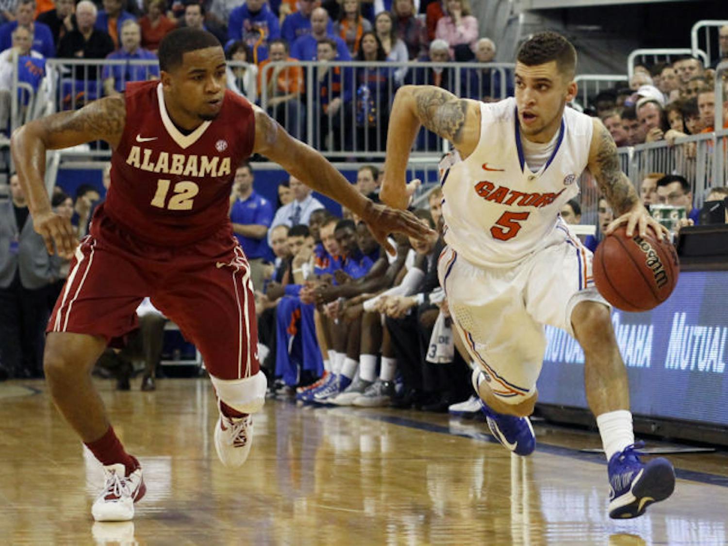 Junior point guard Scottie Wilbekin dribbles down the court during Florida’s 64-52 win against Alabama on March 2 in the O’Connell Center. Wilbekin is playing in his third Sweet 16 as a Gator.
