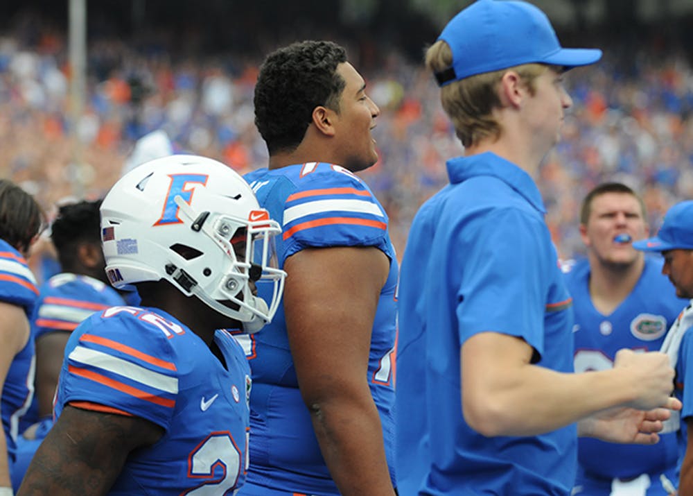 Stone Forsythe stands on the sideline during UF's win over South Carolina on Nov. 12, 2016. For height comparison, the player wearing the helmet is 5-foot-11.