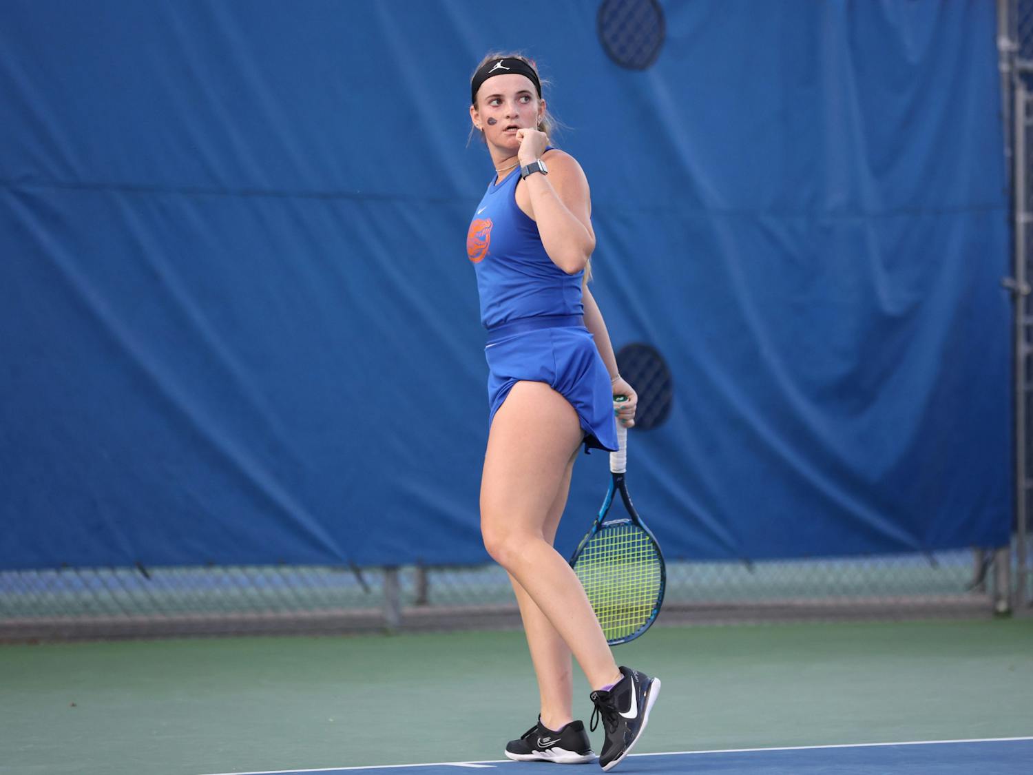 Florida senior Carly Briggs pumps her first during the Gators' match against the Pepperdine Waves Friday, Feb. 24, 2023, at Alfred A. Ring Tennis Complex in Gainesville, Florida.