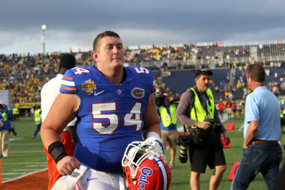 Cam Dillard jogs off the field after Florida's 41-7 loss to Michigan on Jan. 1, 2016, in the Citrus Bowl.
