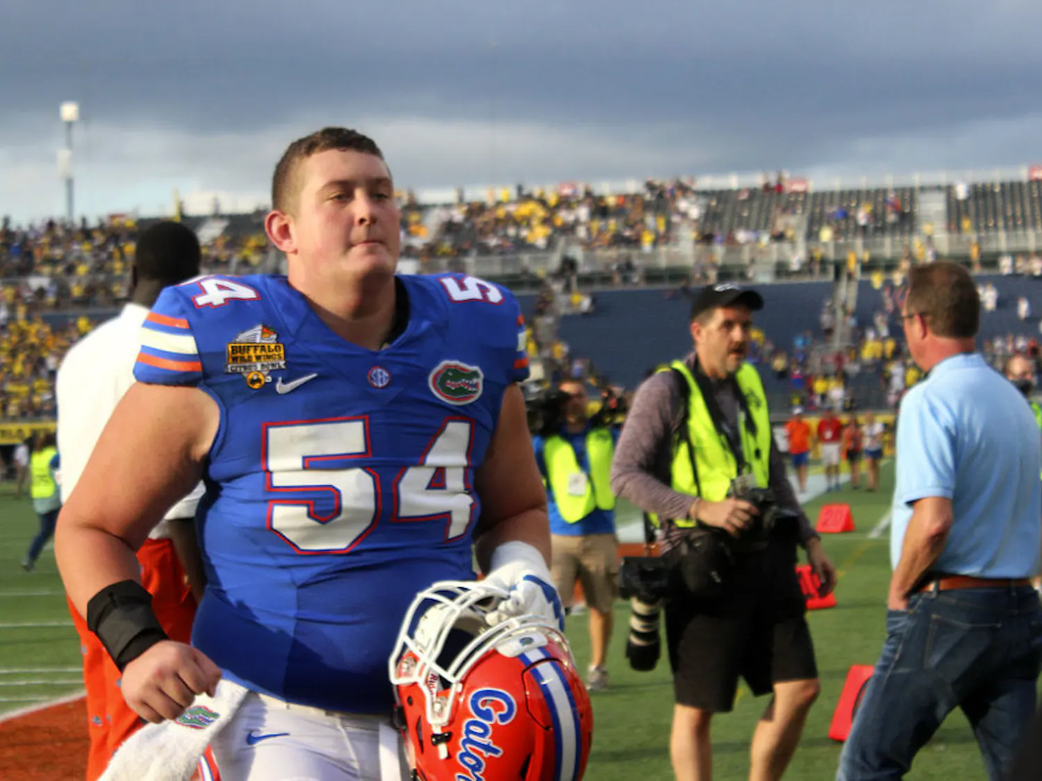 Cam Dillard jogs off the field after Florida's 41-7 loss to Michigan on Jan. 1, 2016, in the Citrus Bowl.