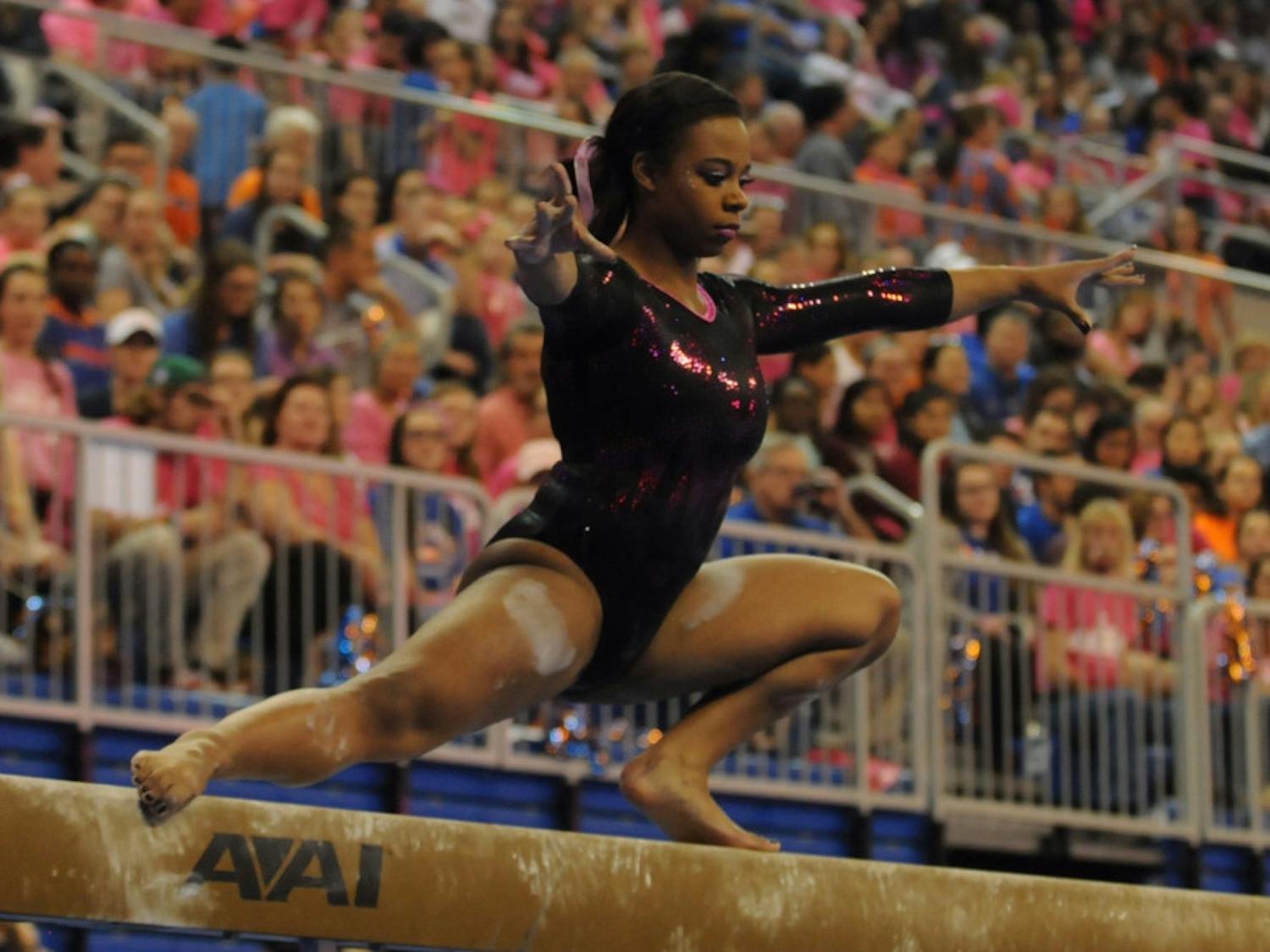 Kennedy Baker performs on the balance beam during Florida's win against Arkansas on Feb. 12, 2016, in the O'Connell Center.