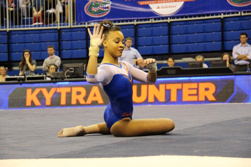 <p>Kytra Hunter performs a floor routine on Friday in the O’Connell Center. Hunter scored a perfect 10 on the floor exercise for the second straight meet — the first consecutive 10s in program history.</p>