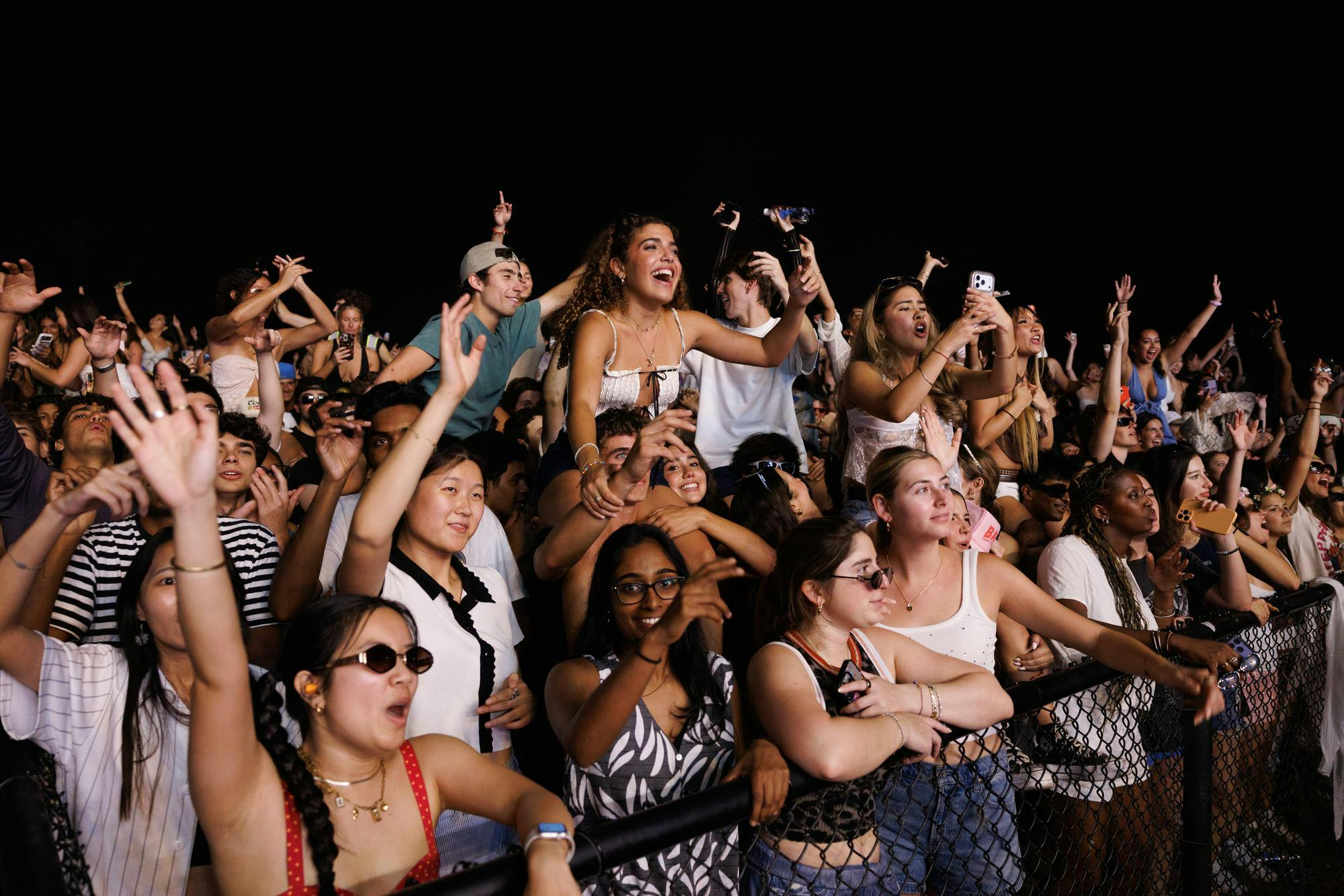 University of Florida students dance while The Chainsmokers perform during SwampFest at Flavet Field, Tuesday, April 14, 2026, in Gainesville, Fla.