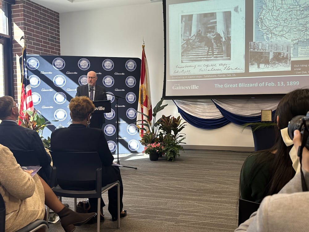 Gainesville Mayor Harvey Ward addresses city residents and officials at the 2024 State of the City Address at the Santa Fe College Blount Center on Tuesday, Feb. 13, 2024.