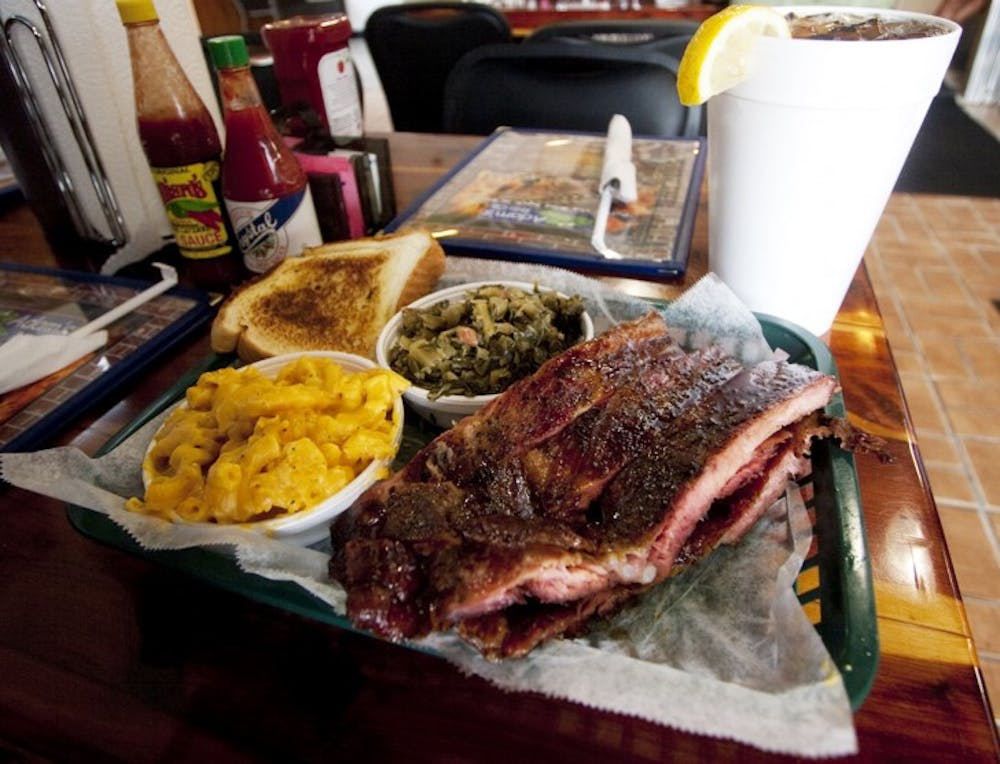 <p>The smells of a plate of collard greens, a half-rack of smoked ribs, Texas toast and macaroni and cheese waft through Adam’s Rib Co.’s second location at 1515 SW 13th St. The restaurant opened its new location Friday after a two-day delay due to a lightning strike.</p>