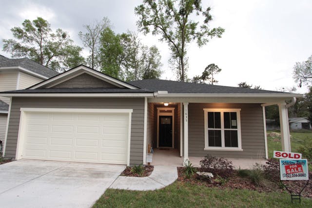 A sold home sits among others for sale in Forest Creek, a 28-lot subdivision off Northwest 34th Avenue. Some realtors are saying that now is the time to buy, not rent, in Gainesville.