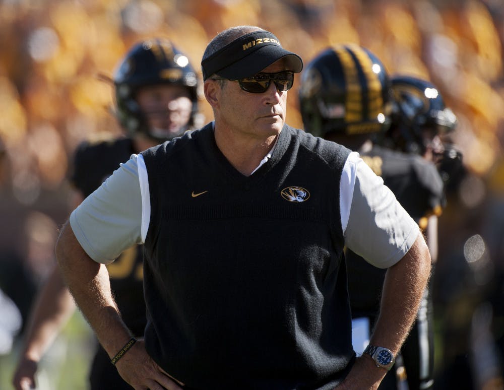 Missouri head coach Gary Pinkel watches his team warm up before the start of an NCAA college football game against Connecticut Saturday, Sept. 19, 2015, in Columbia, Mo. (AP Photo/L.G. Patterson)