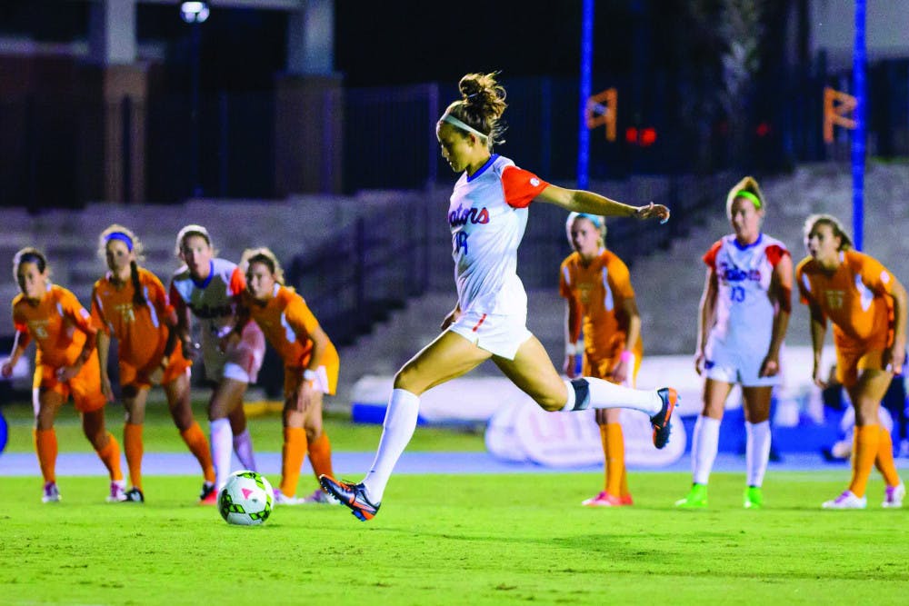 <p>Havana Solaun dribbles the ball during UF's 3-1 win against Tennessee on Friday.</p>