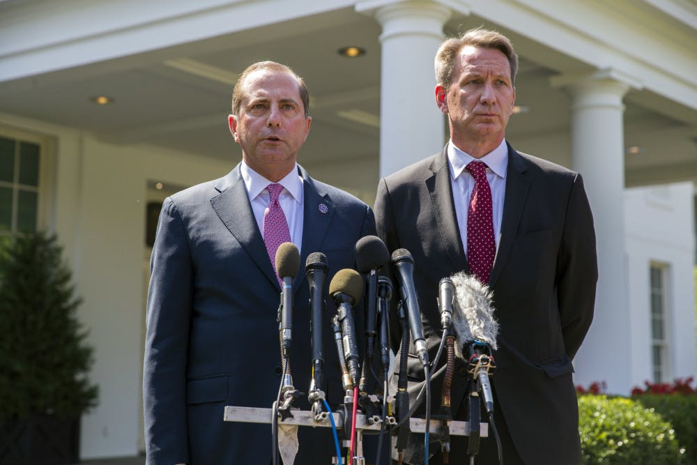 Health and Human Services Secretary Alex Azar, left, and acting FDA Commissioner Ned Sharpless speak with reporters after a meeting about vaping with President Donald Trump in the Oval Office of the White House, Wednesday, Sept. 11, 2019, in Washington. (AP Photo/Alex Brandon)
