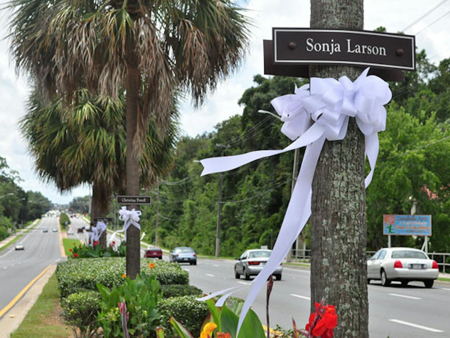 Ribbons placed in remembrance of the victims of serial killer Danny Rolling blow in the breeze on Southwest 34th Street on Thursday. Rolling murdered five students in Gainesville in late August 1990.